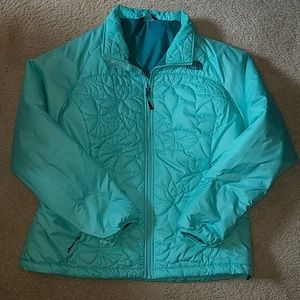 Bright minty green North Face puffy jacket